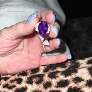 Genuine amethyst and topaz set in .925 Sterling size 7